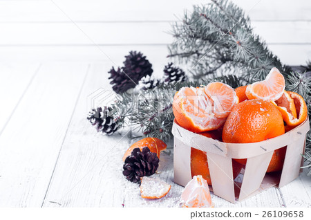 new year composition in basket with mandarins 26109658