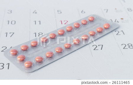 Close up birth-control pill with date of calendar 26111465