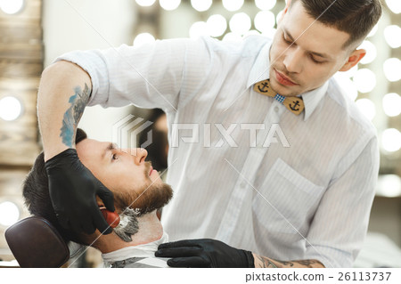 Barber making beard form for man 26113737