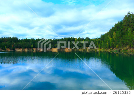 Picturesque lake in the forest Picturesque lake in the forest 26115325