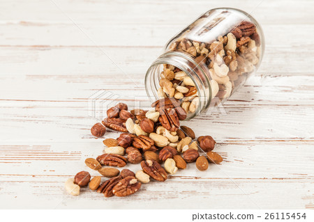 Mix of different nuts closeup photo Mix of different nuts closeup photo 26115454
