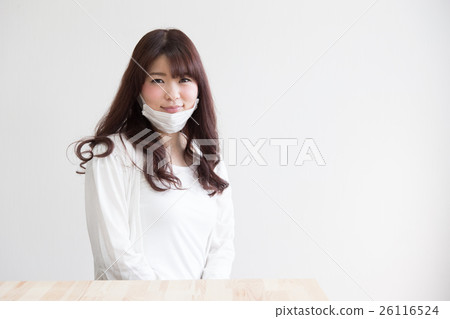 Woman wearing a mask · white back 26116524