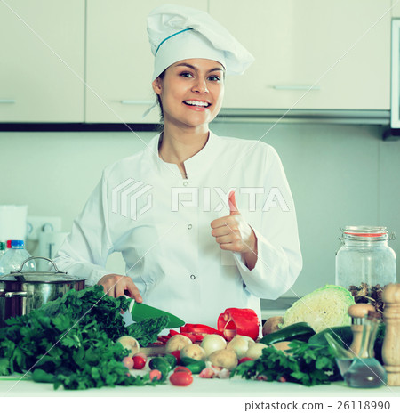 Woman in uniform at kitchen Woman in uniform at kitchen 26118990