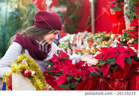 female customer choosing decorations 26119233