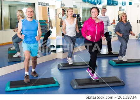 people do crossfit in a fitness club people do crossfit in a fitness club 26119734