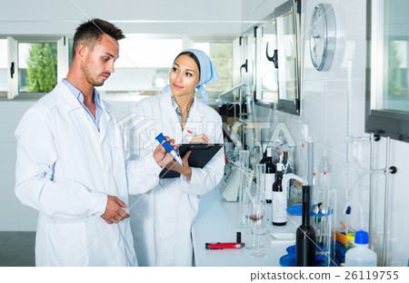 experts making tests in winery laboratory. 26119755