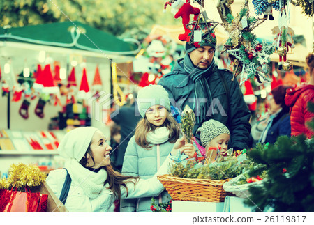 Family buying flower for Christmas 26119817
