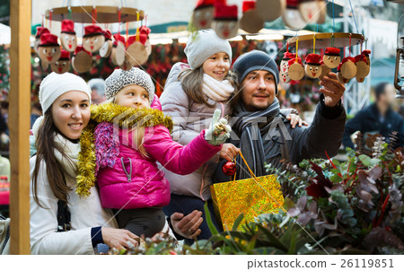 Family with children purchasing toys 26119851