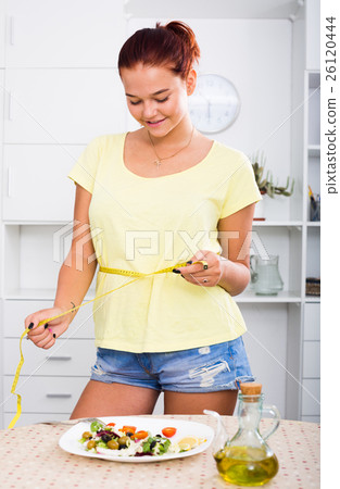 girl with measuring tape girl with measuring tape 26120444