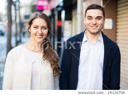 Couple walking in European city 26120706