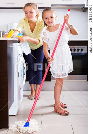 Family of two washing kitchen 26121463