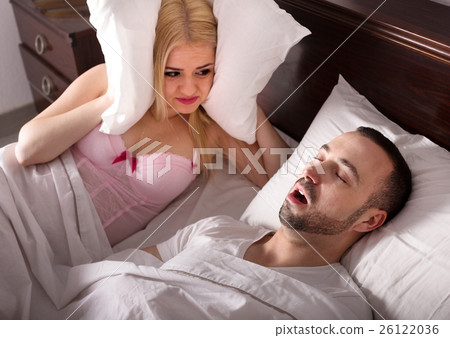 wife and husband snoring in sleep 26122036