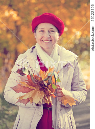 happy mature woman in autumn 26122396