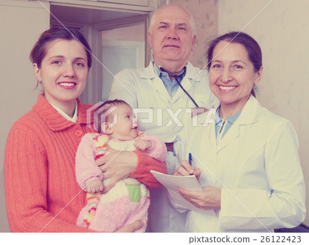 happy mother with baby and doctors 26122423