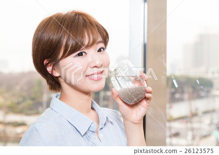 A woman drinking Chia Seed A woman drinking Chia Seed 26123575