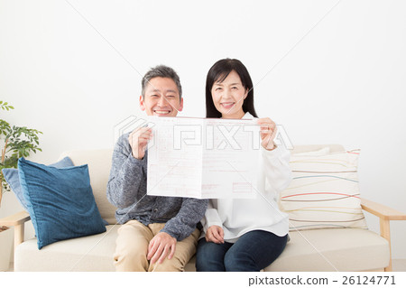 A couple spreading marriage notification A couple spreading marriage notification 26124771