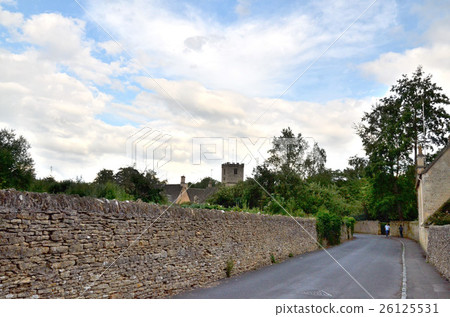 St. Mary's Church was built ahead of the narrow street where Bibury's stone wall is connected 26125531
