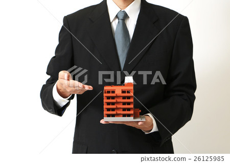A man with an apartment model 26125985
