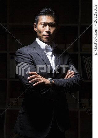 A businessman who tries to arm in the dark A businessman who tries to arm in the dark 26128018