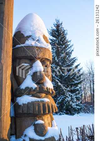 Snowbound wooden sculpture of fairy-tale character 26131242