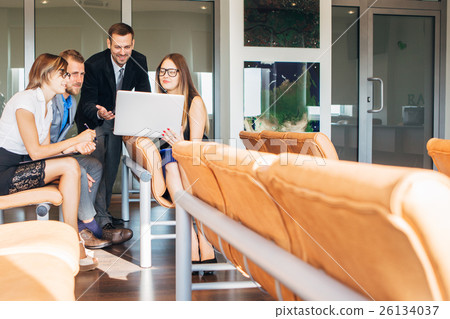 Businesspeople With Digital Tablet Having Meeting 26134037