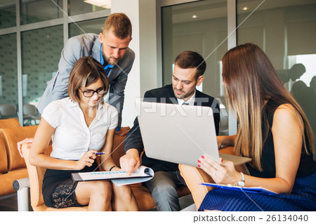 Businesspeople Having Meeting In Modern Office 26134040