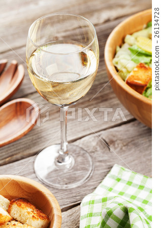 Fresh salad and white wine 26134728