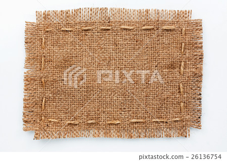 Frame of burlap, lies on a background of burlap Frame of burlap, lies on a background of burlap 26136754