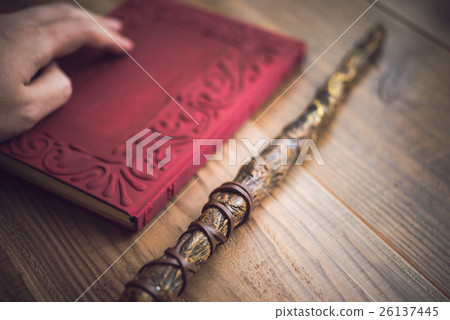 Magical wand and book 26137445