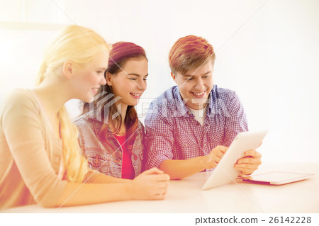 smiling students with tablet pc computer at school smiling students with tablet pc computer at school 26142228