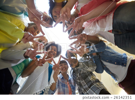 international students showing peace or v sign 26142351