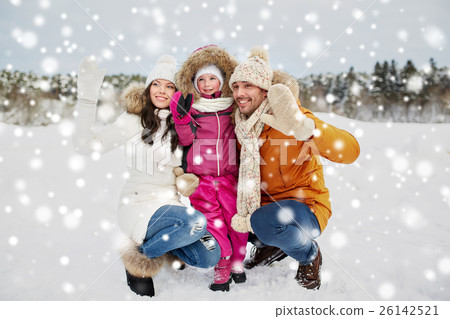 happy family waving hands outdoors in winter happy family waving hands outdoors in winter 26142521