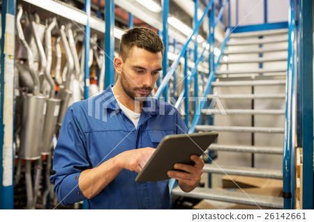 auto mechanic or smith with tablet pc at workshop 26142661