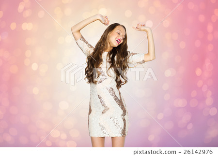 happy young woman or teen girl dancing at party happy young woman or teen girl dancing at party 26142976