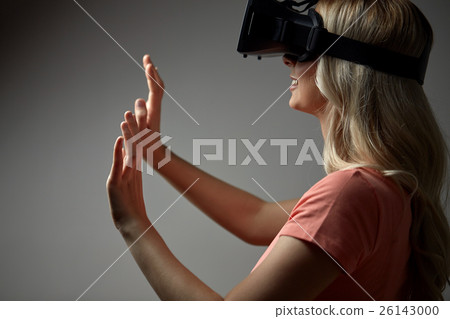 close up of woman in virtual reality headset 26143000