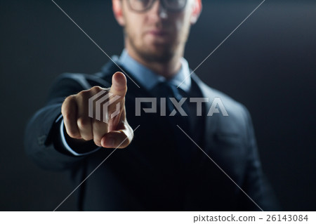 close up of businessman touching virtual screen 26143084