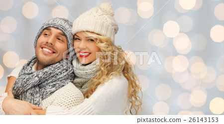 happy family couple in winter clothes hugging happy family couple in winter clothes hugging 26143153