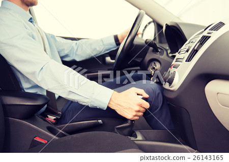 close up of young man driving car close up of young man driving car 26143165