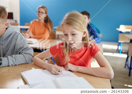 student girl with book writing school test 26143206