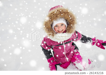 f happy little child or girl with snow in winter 26143216