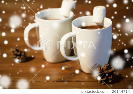 cups of hot chocolate with marshmallow on wood 26144714