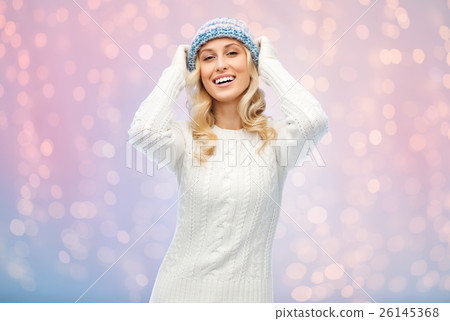 smiling young woman in winter hat and sweater smiling young woman in winter hat and sweater 26145368