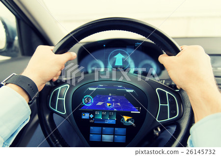 close up of man driving car with gps navigator close up of man driving car with gps navigator 26145732