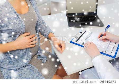 close up of doctor and pregnant woman at hospital 26145873