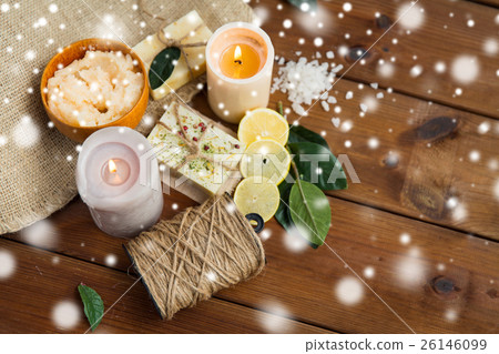 natural soap and body scrub with candles on wood natural soap and body scrub with candles on wood 26146099