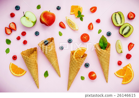Cones and colorful various fruits raspberry . Cones and colorful various fruits raspberry . 26146615