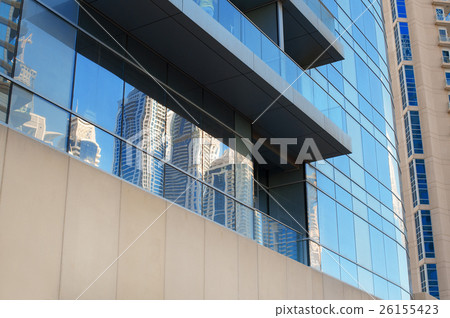 part of a multi-storey office building glass part of a multi-storey office building glass 26155423