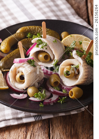 rolls of herring with olives, onions, pickles 26156264