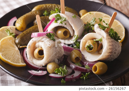 rollmops herring with olives, onions, pickles rollmops herring with olives, onions, pickles 26156267