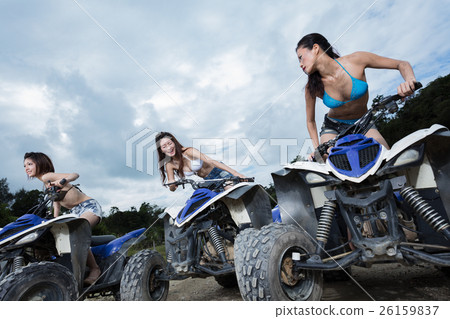 Women riding buggy Women riding buggy 26159837